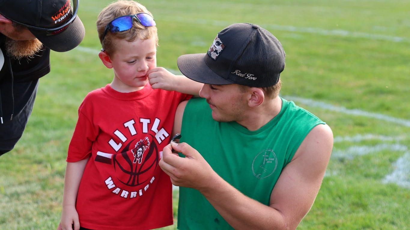 Hard of hearing student-athlete’s success, character inspires others